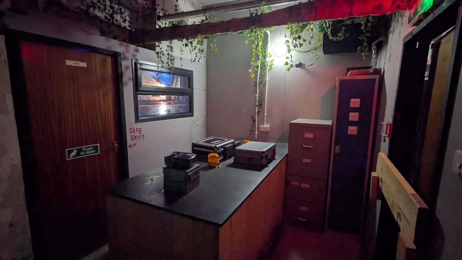 Inside 28 Pasties Later: the office, with filing cabinets and a desk