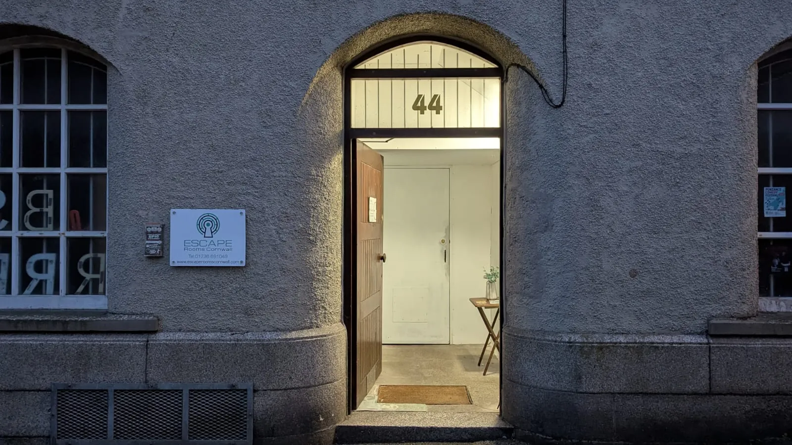 The entrance to Escape Rooms Cornwall: the arched doorway at number 44 New Street, Penzance